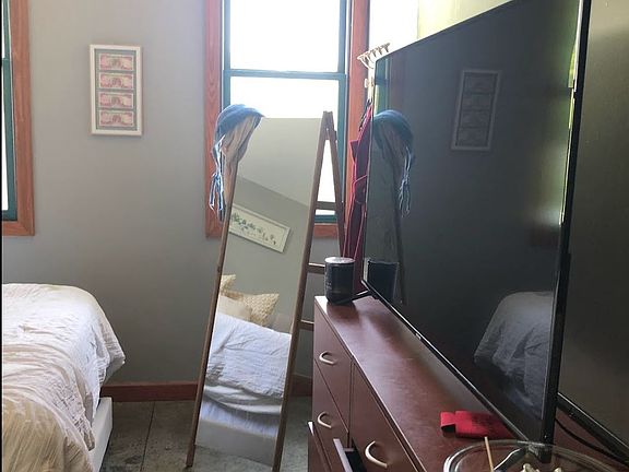 First Floor Bedroom Entrance showing build up drawer furniture included in the apartment unit