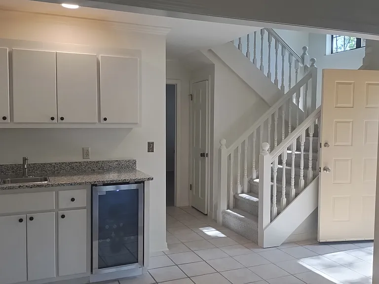 Wet bar with drink refrigerator
