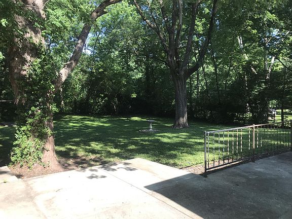 Patio overlooks mature trees and large back yard!