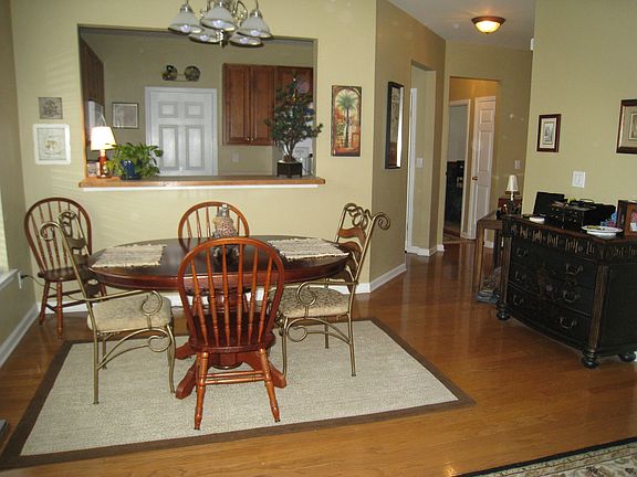 Dining area, large picture window, beautiful wood floors!