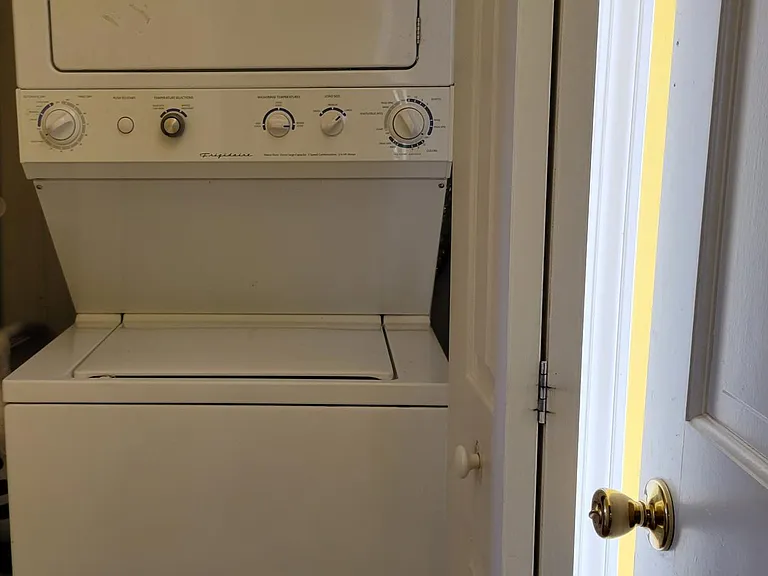 Laundry off kitchen.