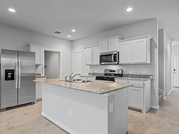 Kitchen-All Home and community information, including pricing, included features, terms, availability and amenities, are subject to change at any time without notice or obligation. All Drawings, pictures, photographs, video, square footages, floor plans, elevations, features, colors and sizes are approximate for illustration purposes only and will vary from the homes as built.