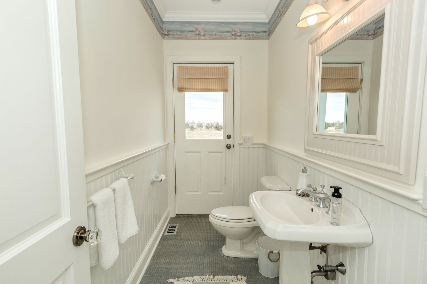  Half bath servicing pool area and outdoor shower