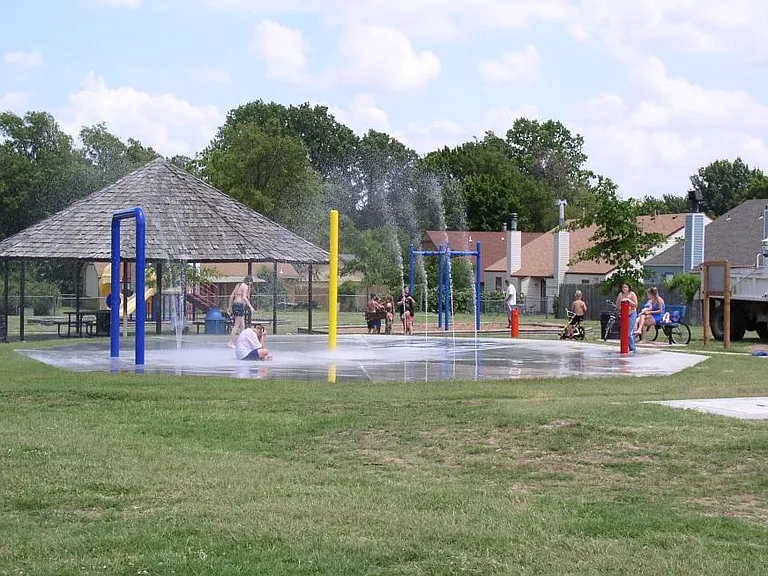 SPLASH PAD IS LESS THAN A BLOCK AWAY.