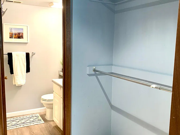Master walk in closet into Master Bath