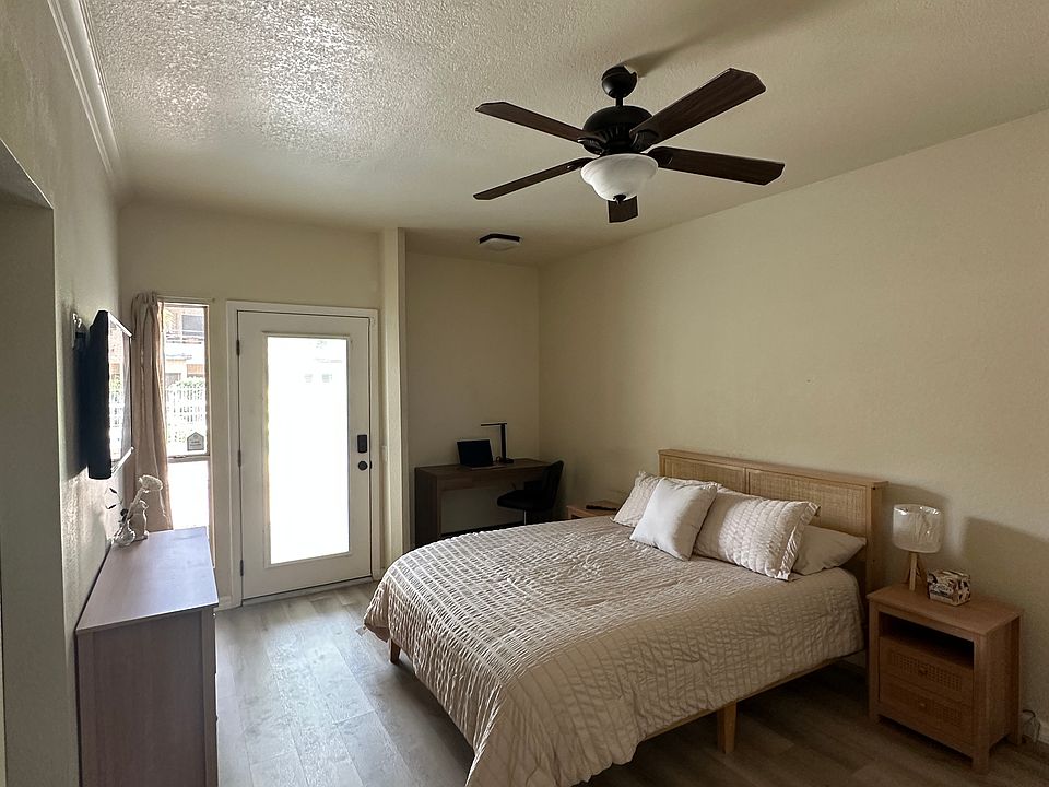 Master Suite Bedroom w/ private full bath, separate security entry, and walk in closet.