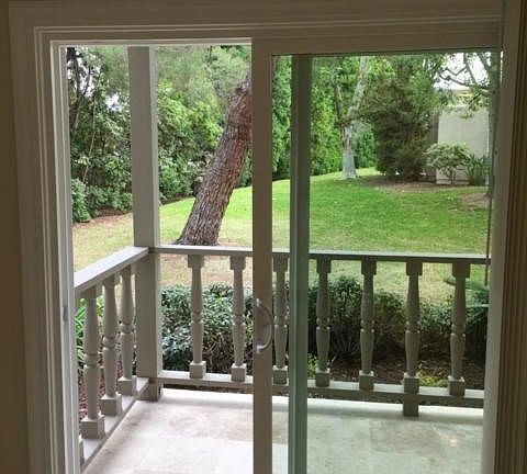 Stone travertine Patio with direct access to the grassy greenbelt.