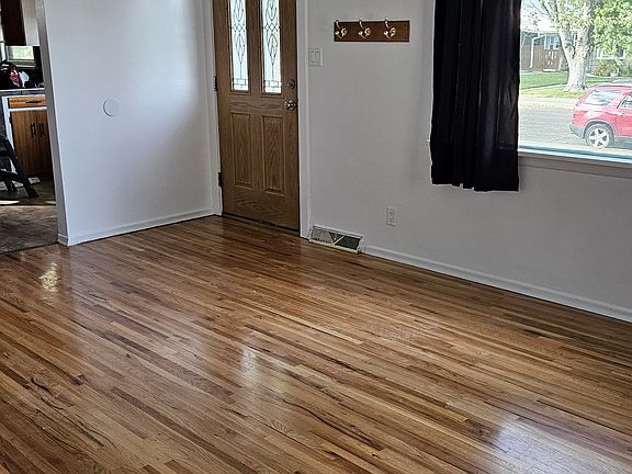 Living Room includes a large picture window.