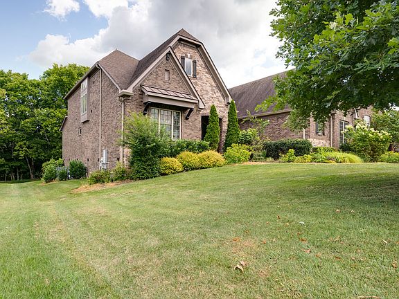 This home backs up to woods behind for great privacy.