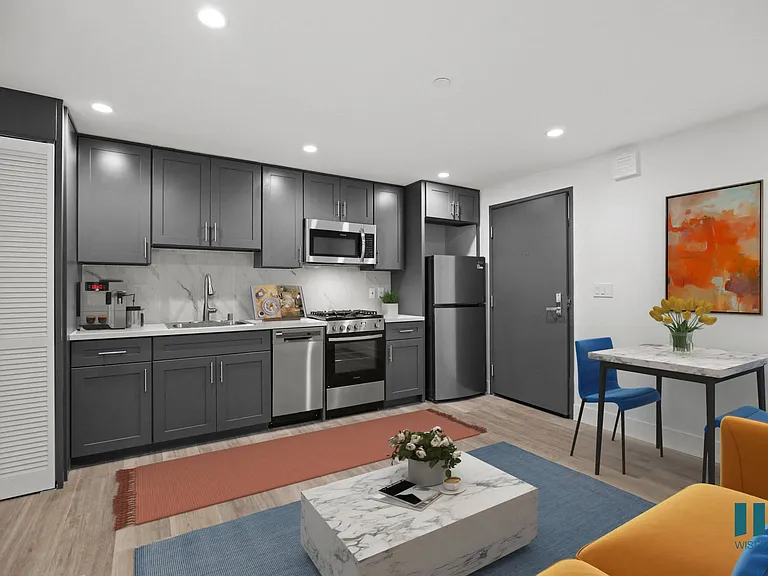 Kitchen with Stainless-Steel Refrigerator, Stove, and Dishwasher