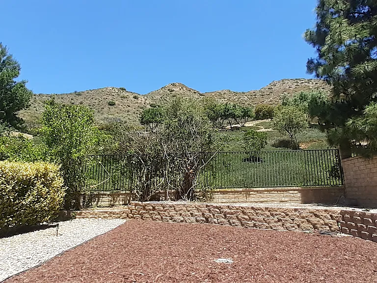 Dedicated Backyard with water conservation. Bring your patio furniture.
Note: Upon agreement, Tenant can install natural grass on the mulch portion. Tenant bearing the cost of removal, installation, sprinkler care and it's water cost for maintenance.
