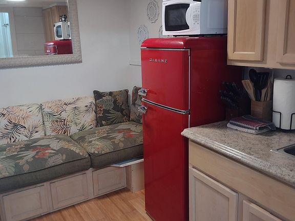 Couch seating area with storage below