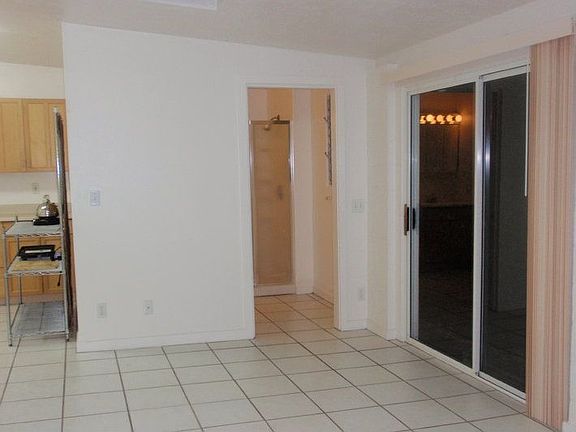 View Kitchen, Bathroom, Front Doors From Living Rm