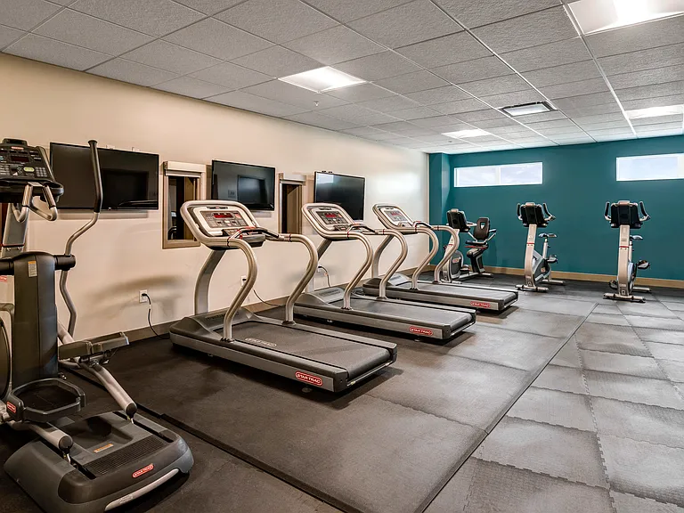 24/7 fitness center and yoga room