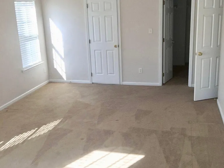 Master bedroom with private bathroom and spacious walk-in closet