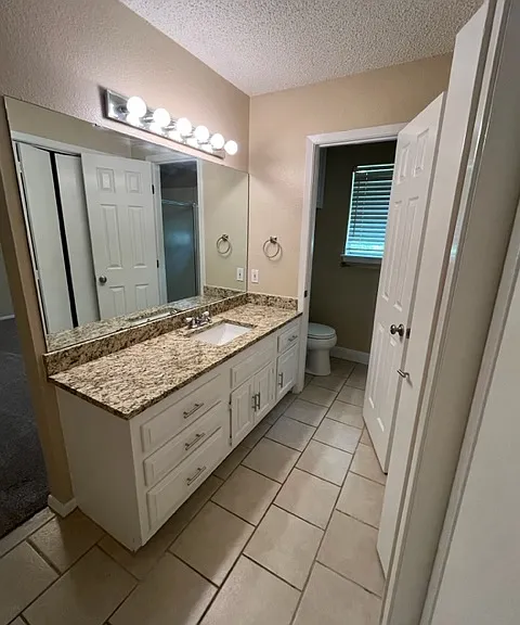 master bath, toilet and shower
