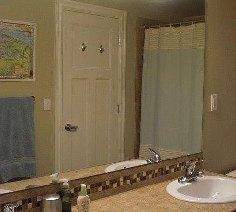 Upstairs bathroom, dual sinks with doors to the hall and 2nd bedroom