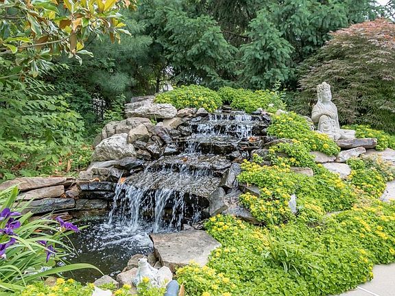 Enjoy the serene sounds of your waterfall in the backyard