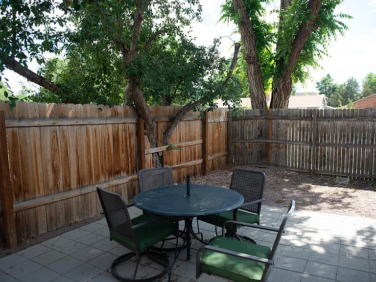 Continuation of private back yard oasis with access to off street parking for two cars