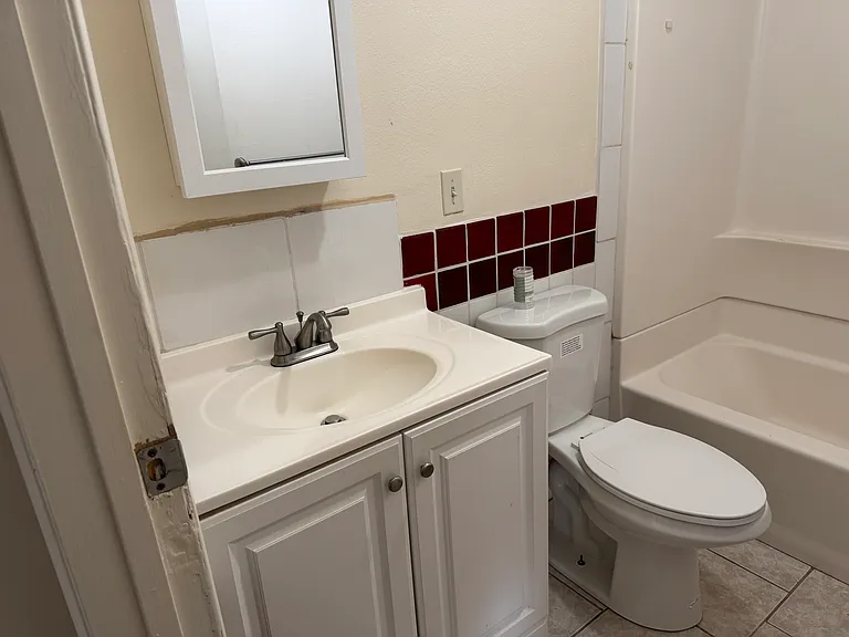 Bathroom with full tub