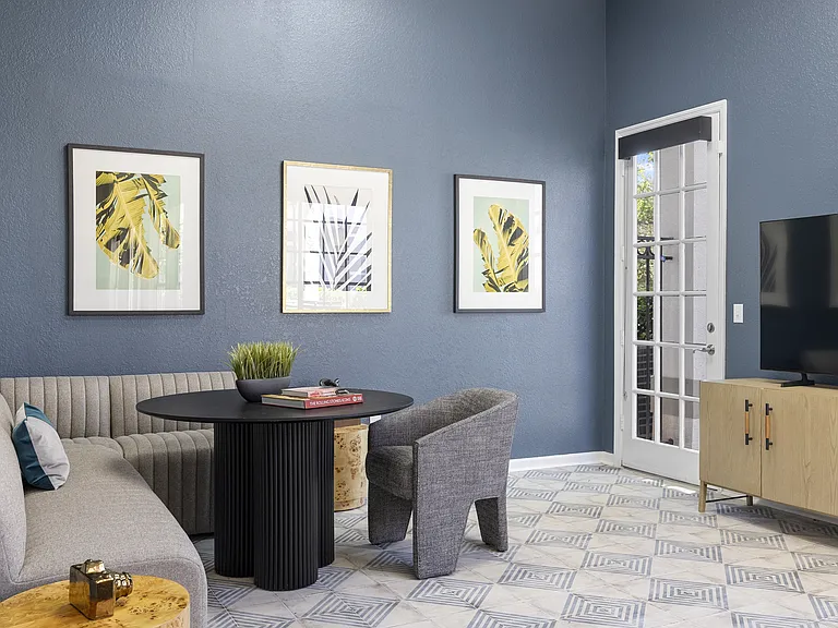 Cozy resident lounge with natural light for catching up with neighbors