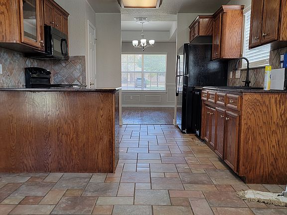 French tile in kitchen, hallways and bathrooms