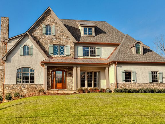 Stone & Brick manor home w/nearly 7500SF of living