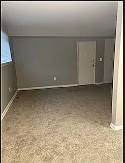 Create your ideal living space in this cozy, neutral-toned room.