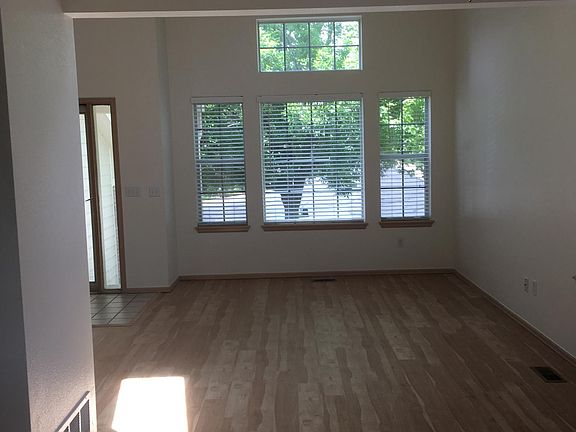 Living room with vaulted ceilings