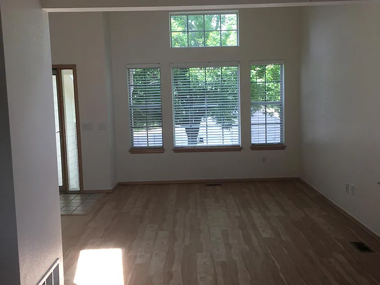 Living room with vaulted ceilings