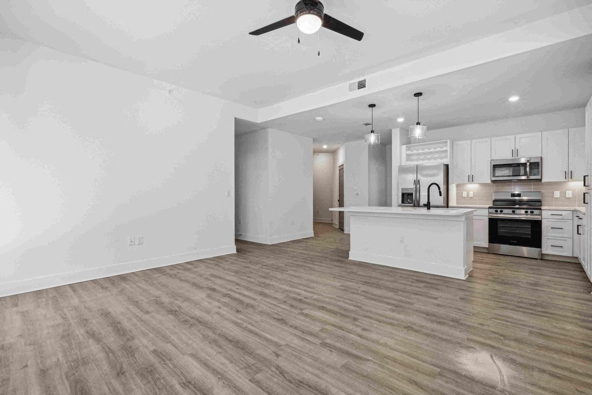 Living Room, Kitchen, & Dining Area