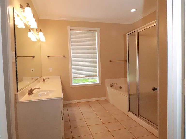 master bath with walk in closet