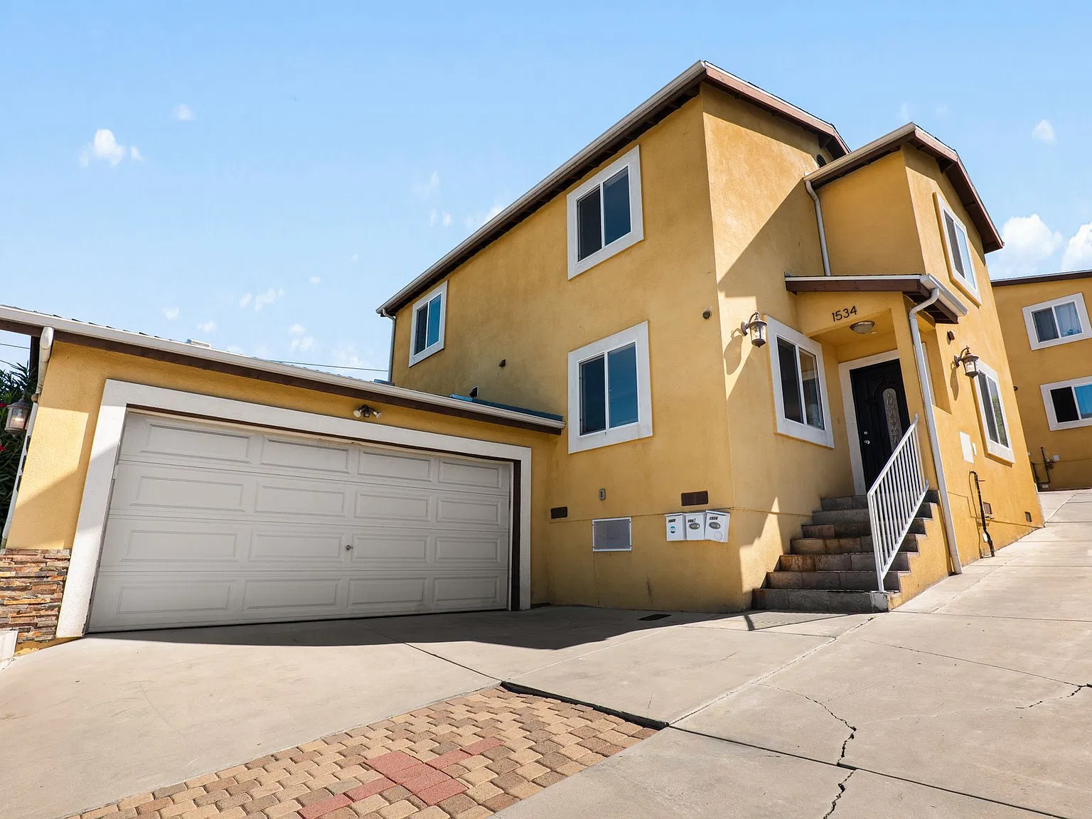 4 Bedroom / 3 Bath House with In-Unit Laundry & Private Garage! — Photo 1