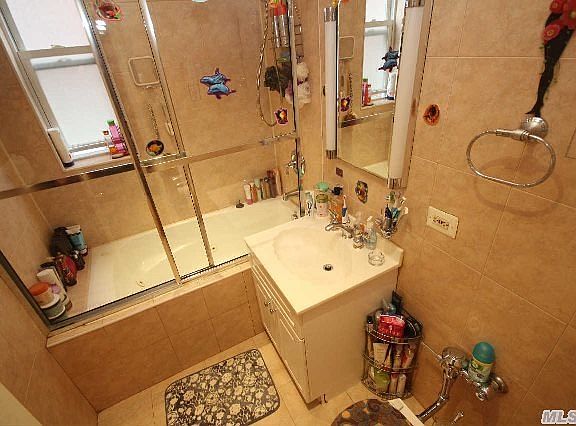 5th image of 65-36 Wetherole St #205