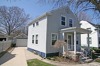 Maintainance free exterior with newer windows & vinyl siding.