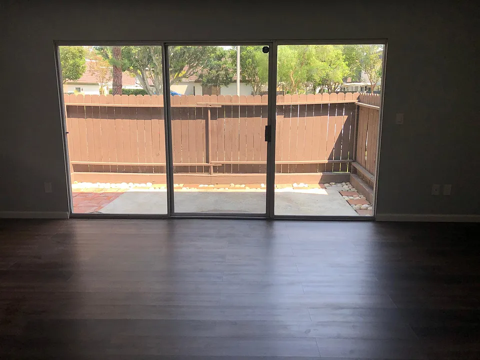 Sliding glass window leading to patio