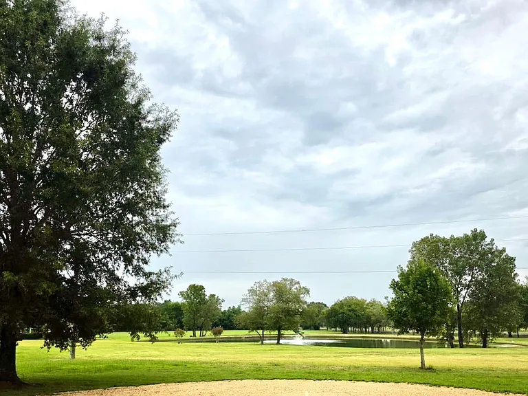 View from front door of pond and fountains
