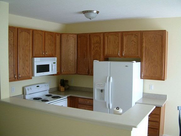 Open kitchen with 42" raised panel cabinetry