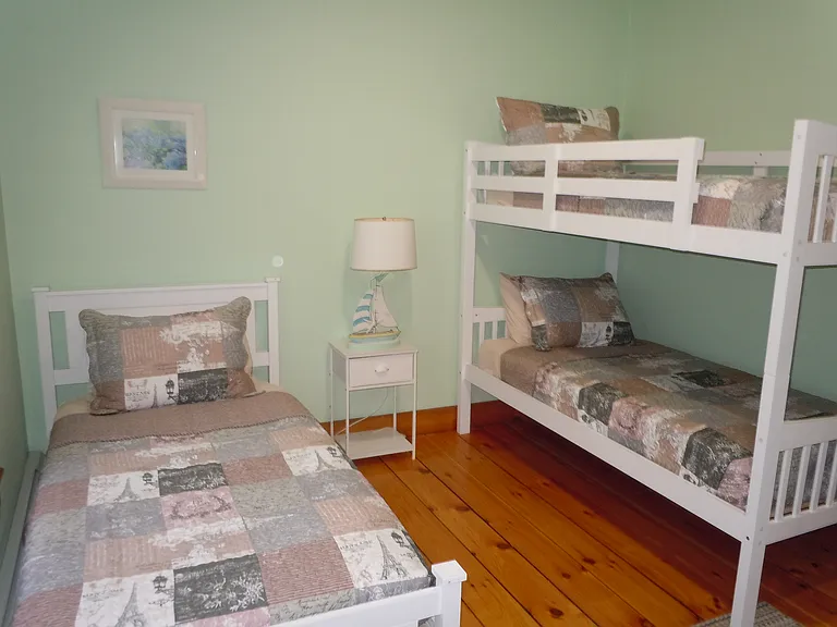 Third bedroom with 3 twin beds.