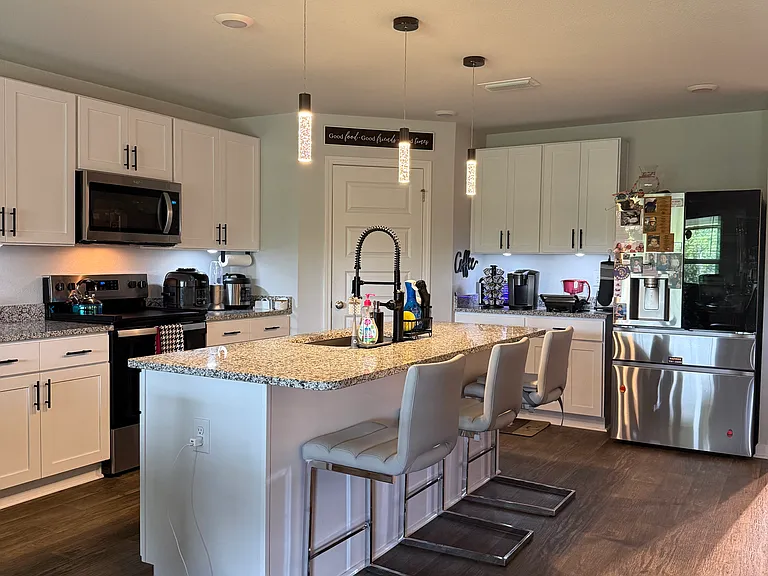 All kitchen cabinets with pulls and Soft-close feature.