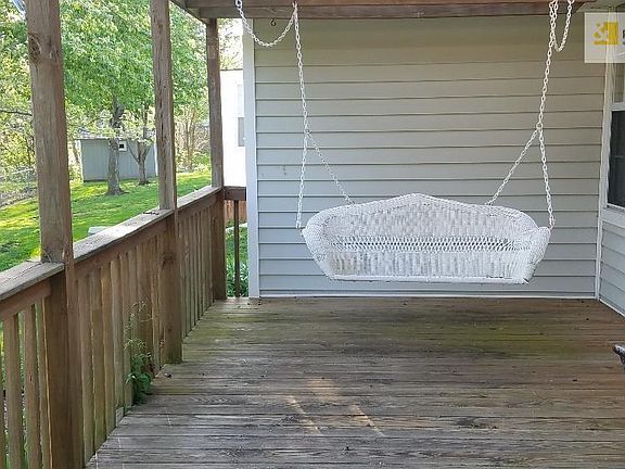 Large deck with latice/pergola for shade.