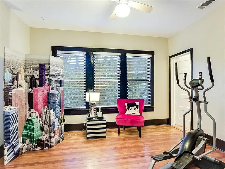 Smallest bedroom shown as a workout room.