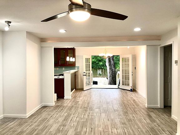 Living room looking towards dining and backyard