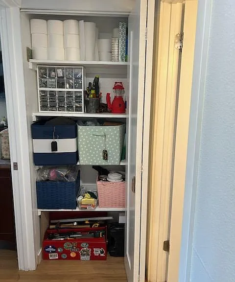 large storage closet at end of hallway