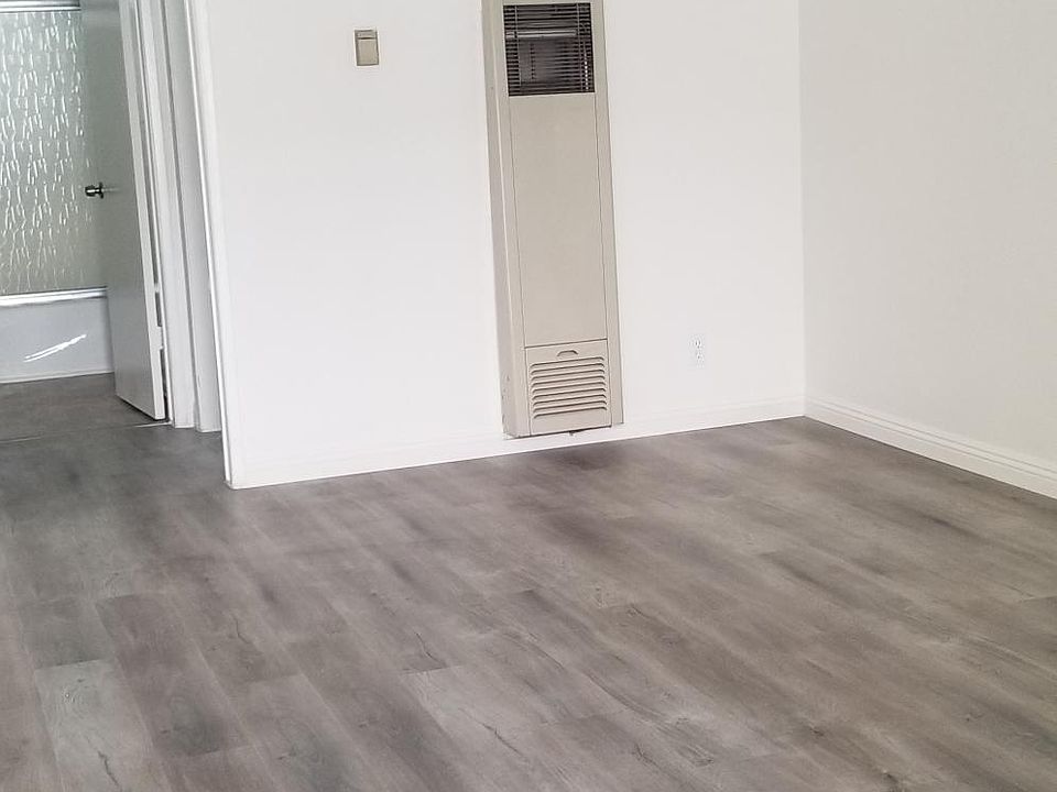 Living area and wall heater