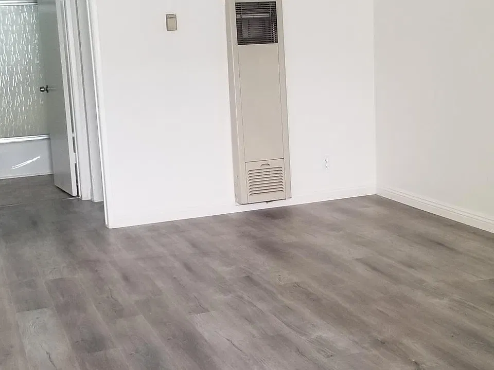 Living area and wall heater