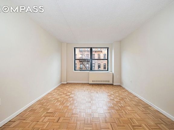 2nd image of 225 E 6th St APT 6A