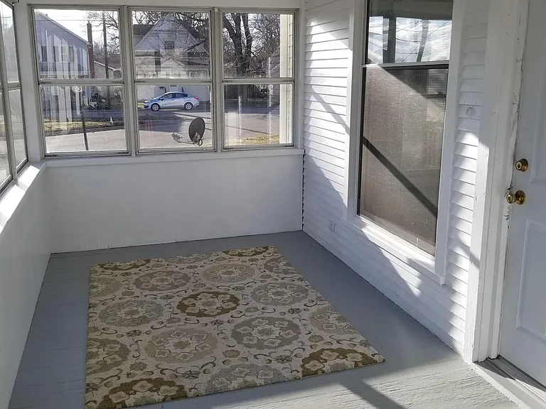 Enclosed shared front porch