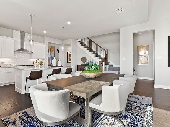 Open first floor in the Greenbrier home plan by Trophy Signature Homes - REPRESENTATIVE PHOTO