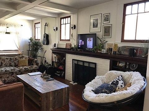 Living room with decorative fireplace